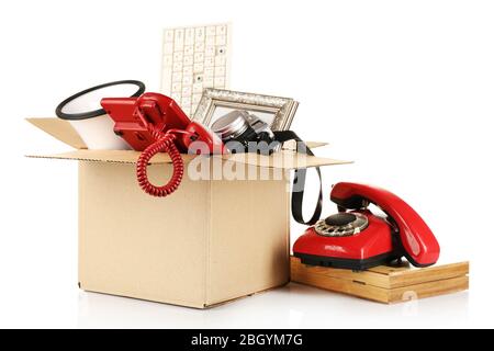 Box of unwanted stuff isolated on white Stock Photo