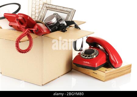 Box of unwanted stuff isolated on white Stock Photo