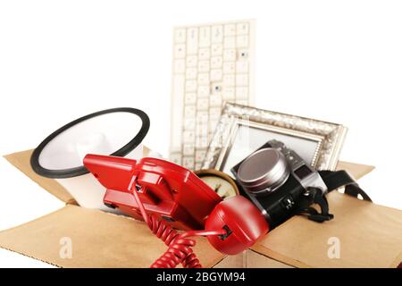 Box of unwanted stuff isolated on white Stock Photo