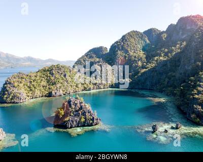 Aerial of magnificent Coron island lagoon, turquoise clear water and breathtaking views. Stock Photo