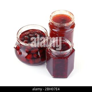 Homemade jars of fruits jam isolated on white background Stock Photo