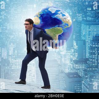 The businessman carrying earth on his shoulders Stock Photo