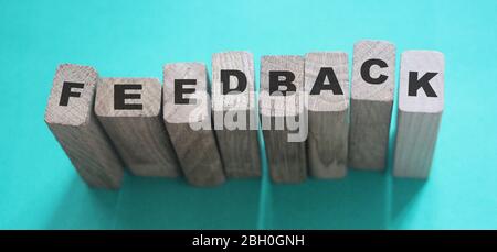 FEEDBACK word made with building blocks. Performance evaluation business concept Stock Photo