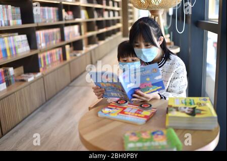 Hengshui, China's Hebei Province. 23rd Apr, 2020. People read at a library in Taocheng District of Hengshui, north China's Hebei Province, April 23, 2020. World Book and Copyright Day falls on April 23 yearly to promote reading, publishing and copyright. Credit: Zhu Xudong/Xinhua/Alamy Live News Stock Photo