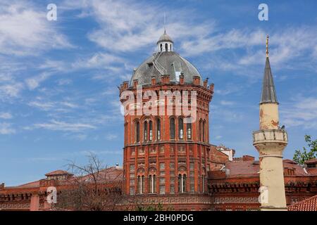 Dome of Fener Greek Orthodox School and minaret, in Fener, Istanbul, Turkey Stock Photo