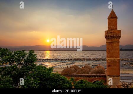 Tugrul Bey Mosque on the Lake Van, at the sunset in the town of Adilcevaz, in the province of Bitlis, Turkey Stock Photo