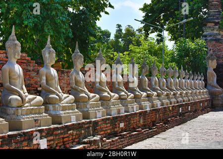 Buddha statues in  the ancient temple known as Wat Yai Chai Mongkhon, in Ayutthaya, Thailand. Stock Photo