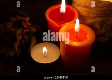 series of colored candles that create atmosphere Stock Photo