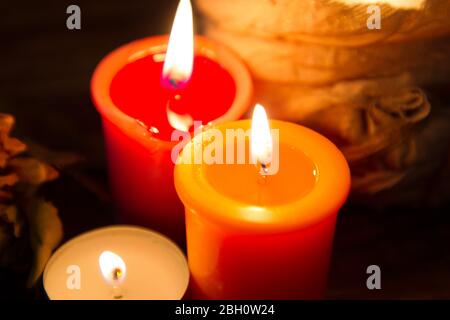 series of colored candles that create atmosphere Stock Photo