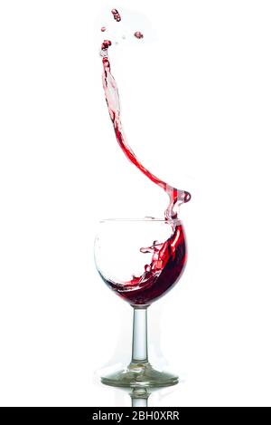 glass splash red wine with white background celebration Stock Photo
