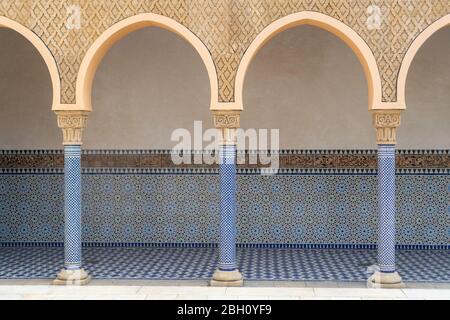 arabic arcade colonnade portico with wooden ceiling with ornaments Stock Photo