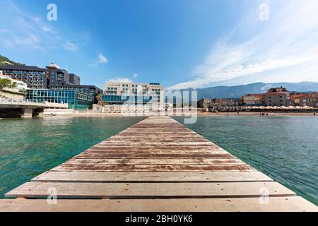 Wooden pier on the beach in the old town of Budva, Montenegro Stock Photo