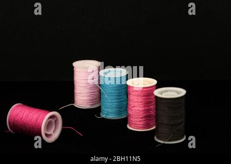 Colorful spools of thread Stock Photo