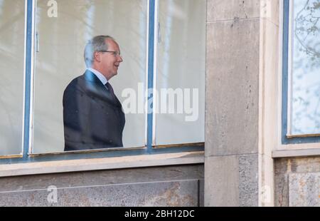 23 April 2020, Lower Saxony, Hanover: Stefan Schostok (SPD), former mayor of the city of Hanover, walks across a corridor in the district court. The verdict in the trial of the Hanover city hall affair will be delivered on Thursday. Photo: Julian Stratenschulte/dpa Stock Photo