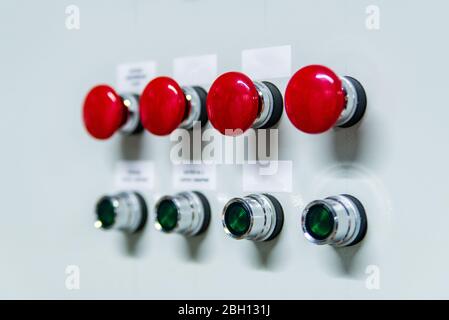 Control panel with red and black buttons. Equipment start and shutdown buttons Stock Photo
