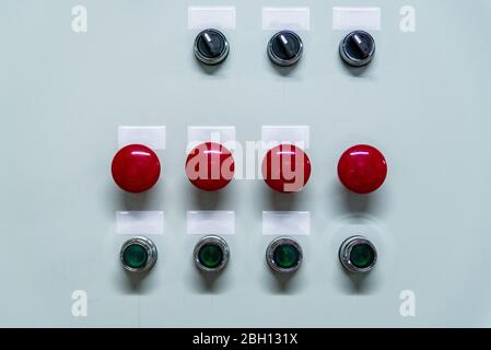 Control panel with red and black buttons. Equipment start and shutdown buttons Stock Photo