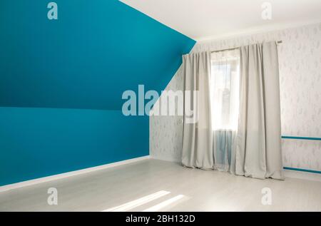 Empty bold blue tilted bed room wall, gray curtains, white sun day curtains, white parquet wood pattern flooring. Stock Photo