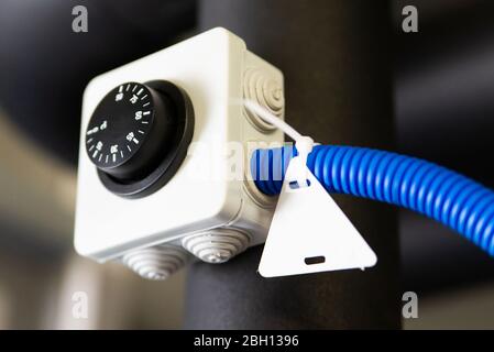 Temperature adjuster or Temperature regulator of water heater or boiler Stock Photo