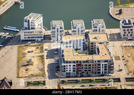 construction of a multi-family house residential area at Phoenix Lake other Hoerder Brook Parkway in Dortmund, on the left side Specialists Zentum at Phoenix Lake (FAPS), 18.04.2016, aerial view, Germany, North Rhine-Westphalia, Ruhr Area, Dortmund Stock Photo