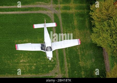 , Ultralight aircraft in flight above a field in Hamm, 18.04.2016, aerial view, Germany, North Rhine-Westphalia, Ruhr Area, Hamm Stock Photo
