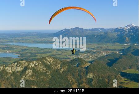 paraglider over the pre-Alps, Germany, Bavaria, Allgaeu Stock Photo