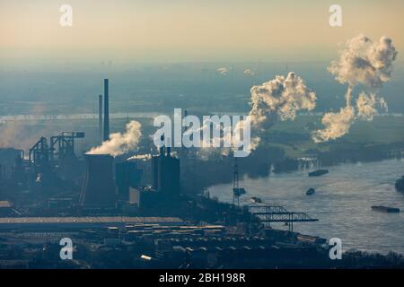 industry area of Huettenheim in backlight, Krupp Mannesmann HKM, 07.20.2019, aerial view, Germany, North Rhine-Westphalia, Ruhr Area, Duisburg Stock Photo