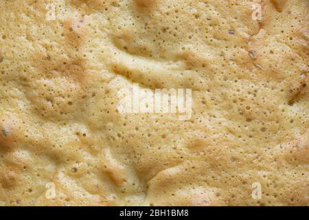 baked dough. the texture of the pie. abstract background with the surface of the pie Stock Photo