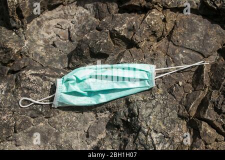 Beirut, Lebanon. 23 April 2020. Discarded single use facemasks to prevent the spread of covid-19 infections are found on the streets of Beirut. Environmental groups are warning that discarded masks  protective equipment used to prevent the spread of coronavirus could harm the environment. Credit: amer ghazzal/Alamy Live News Stock Photo