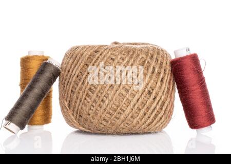 Group of four whole thread spools for sewing isolated on white Stock Photo