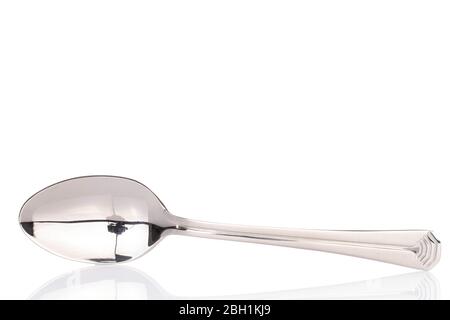 One whole spoon isolated on white Stock Photo