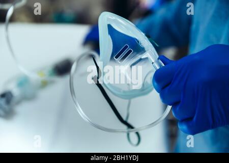 The doctor is holding an oxygen mask Stock Photo - Alamy