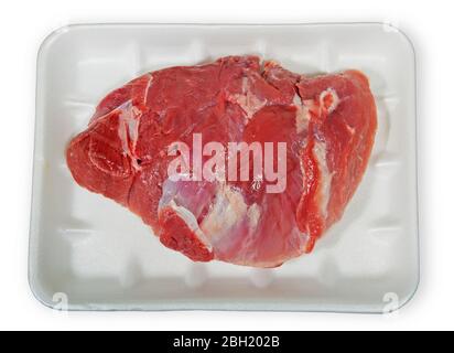 Raw meat in packaging isolated on a white background. Stock Photo