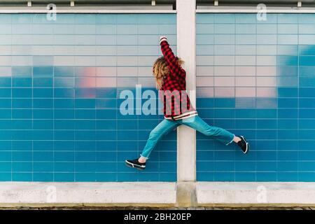 Teenage girl jumping in the air Stock Photo