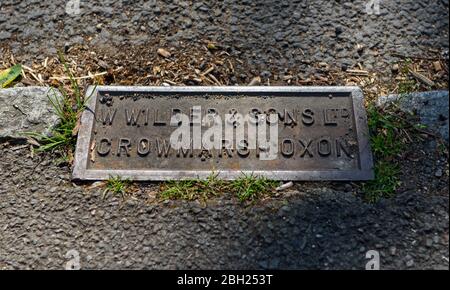 Cast Iron curbside drain made by W. Wilder and Sons Ltd, Crowmarsh Oxon, this company closed in the early 1990's Stock Photo