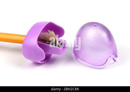 Plastic pink pencil sharpener isolated on white background. High resolution photo. Full depth of field. Stock Photo