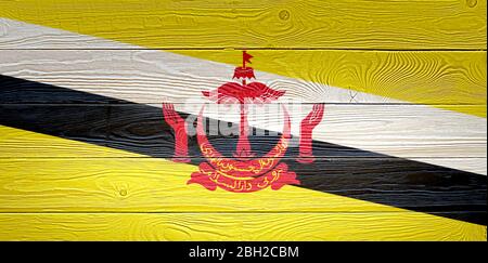 Brunei Flag painted on old wood plank background Stock Photo - Alamy