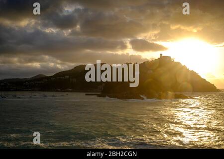 Spain, Gipuzkoa, San Sebastian, Monte Igueldo and Bay of La Concha at sunset Stock Photo