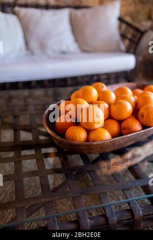 Bowl of oranges on couch table, Mallorca, Spain Stock Photo