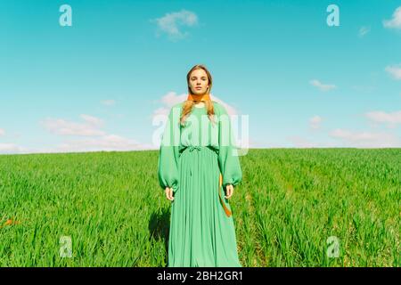 Portrait of young woman with ribbon around her neck Stock Photo - Alamy