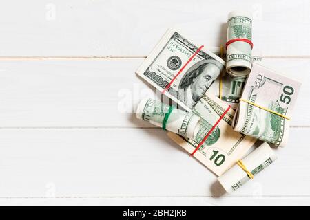 US Dollar bills bundles stack. one hundred dollar bills with stack of money in the middle. Top view of business concept on background with copy space. Stock Photo