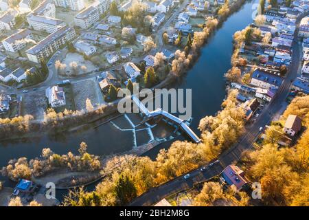 Germany, Bavaria, Wolfratshausen, Drone view Loisach river flowing through town in Alpine foothills Stock Photo