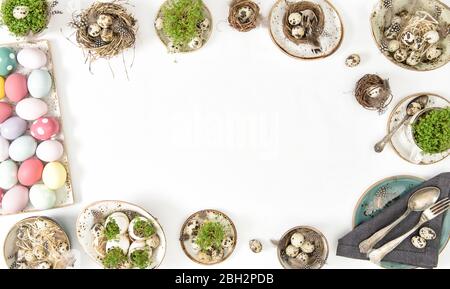 Easter flat lay banner. Festive decoration with colored eggs Stock Photo