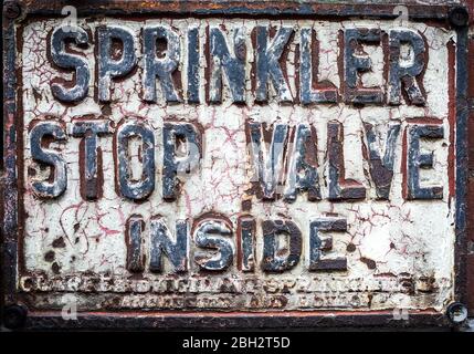 Sprinkler Stop Valve Inside Cast Iron Sign London Stock Photo
