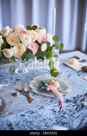 Luxury wedding, party, birthday. Festive table decor. Sea style with different natural blue, pink colors and flowers. Bouquet of roses Pride of Jane Stock Photo