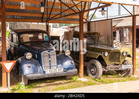 Myshkin, Yaroslavl Region, Russia, August 01, 2013. Museum of Retrotechnics Old garage. Cars Orel and Jeep. Stock Photo