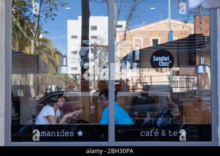 Barcelona, Spain - 9 April 2015: People eating in the restaurant Stock Photo