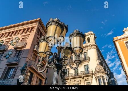 Street lamp, Modermisme buildings, Casa Bruno Cuadros,  Ramblas, La Rambla, Barcelona, Spain Stock Photo