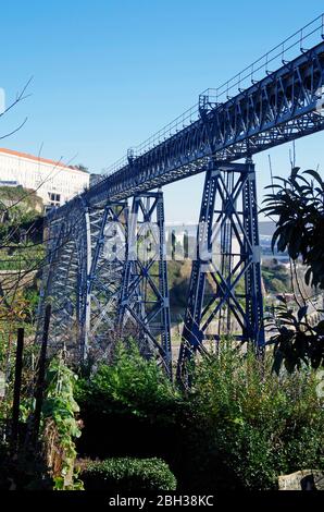 Gustav Eiffel’s pioneering Maria-Pia railway bridge over the river Douro near Porto, built 1876-77, then the world’s longest non-suspension bridge Stock Photo