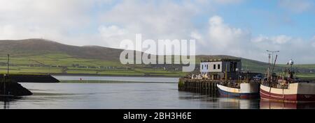 Dingle, Ireland - 11th March, 2017: fishing Trawlers docked in Dingle harbour on the west coast of Ireland. Stock Photo