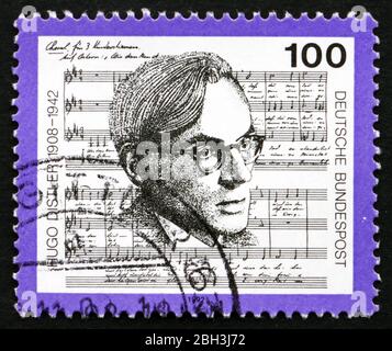 GERMANY - CIRCA 1992: a stamp printed in the Germany shows Hugo Distler, Composer, circa 1992 Stock Photo